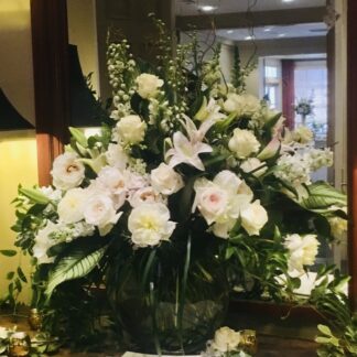 Half moon large vase all white flowers